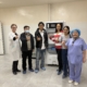 The-Saada-medical-team-poses-with-Kyrgyz-medical-staff-in-front-of-the-sterilizer-