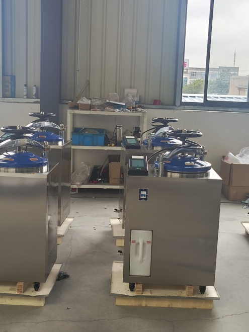 11 autoclaves lined up for export in warehouse